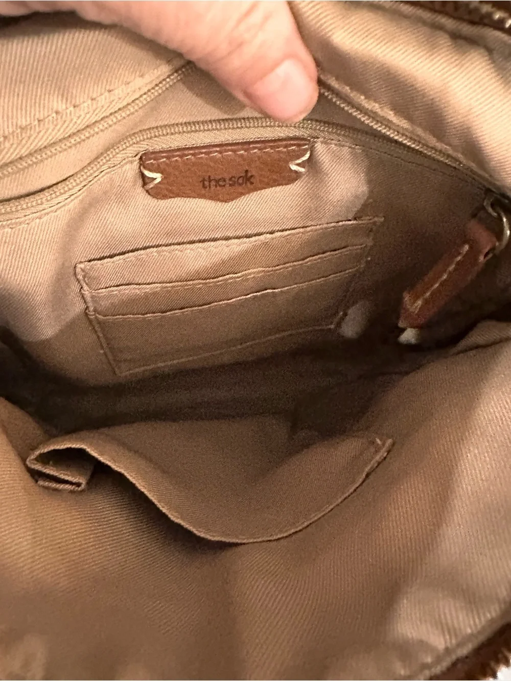 The Sak embossed accents access